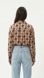 orange geometry shirt