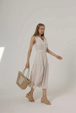 sleeveless brown belted dress