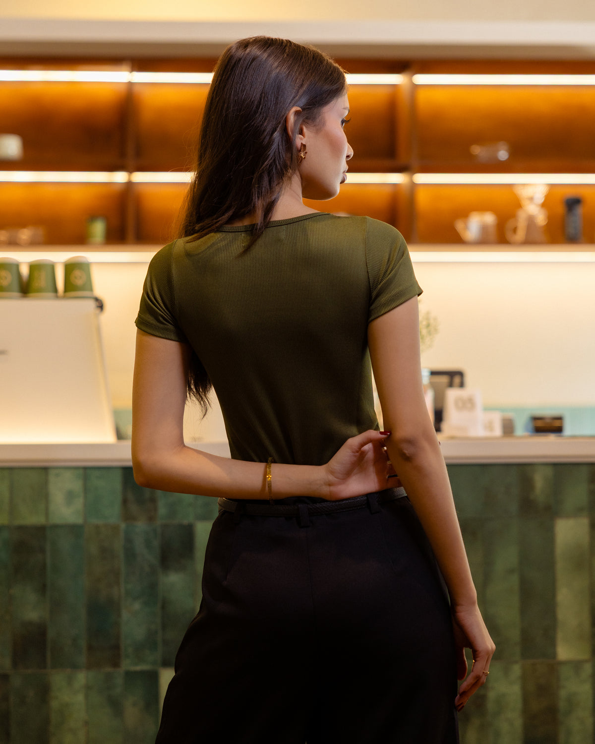 green bodysuit